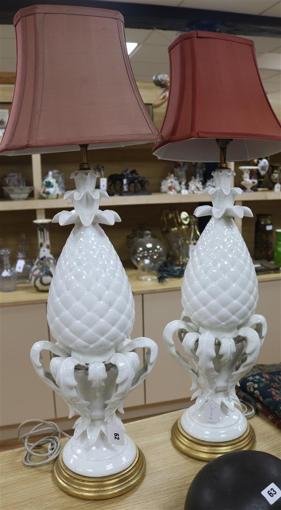 A pair of decorative pineapple lamps